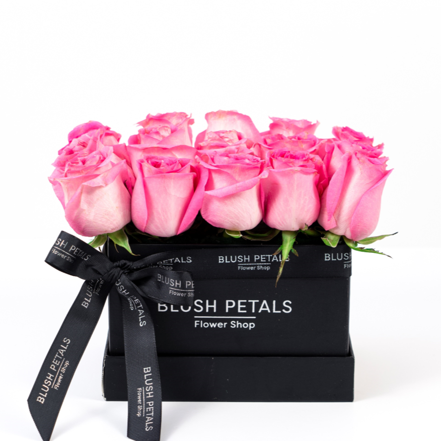 pink roses bouquet in a box